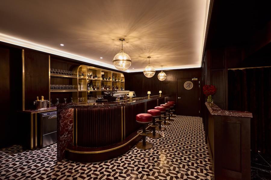 Ronnie's New York in London Regent street bar lounge black and white floor red velvet bar stools wine red marble brass details bar
