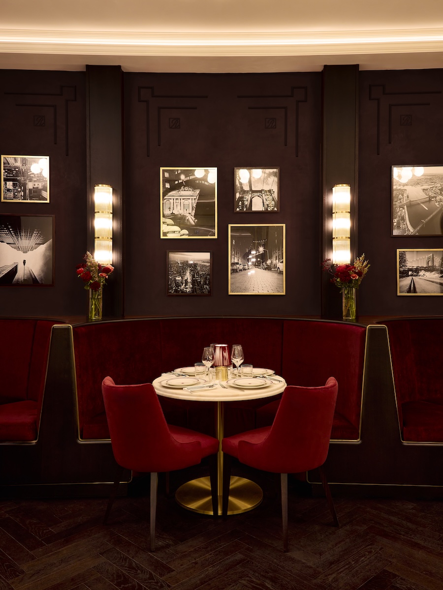 Ronnie's New York in London Regent street main dining room black and white photographs gallery red velvet dining booth chairs