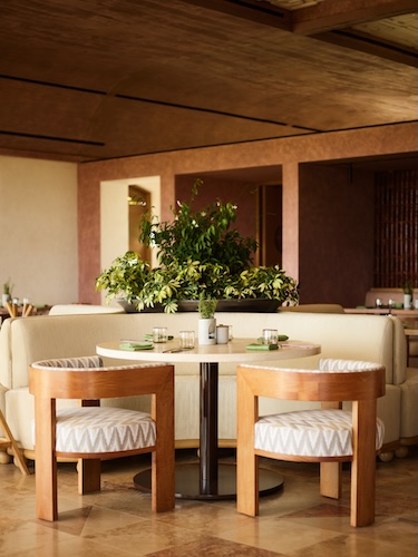 one&only palmilla social club lucille's dining room restaurant white curved banquette coastal design