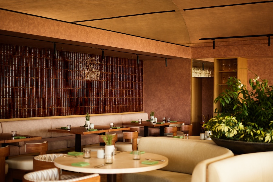 one&only palmilla social club lucille's dining room restaurant white curved banquette coastal design